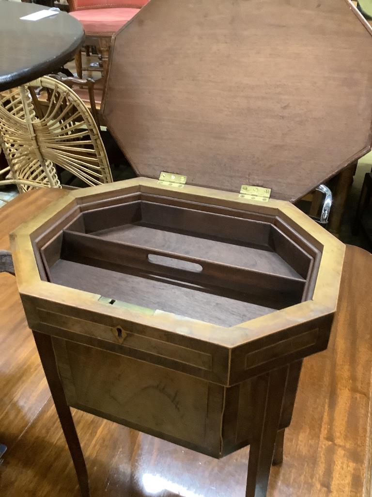 A George III octagonal mahogany work table, width 43cm, depth 31cm, height 58cm